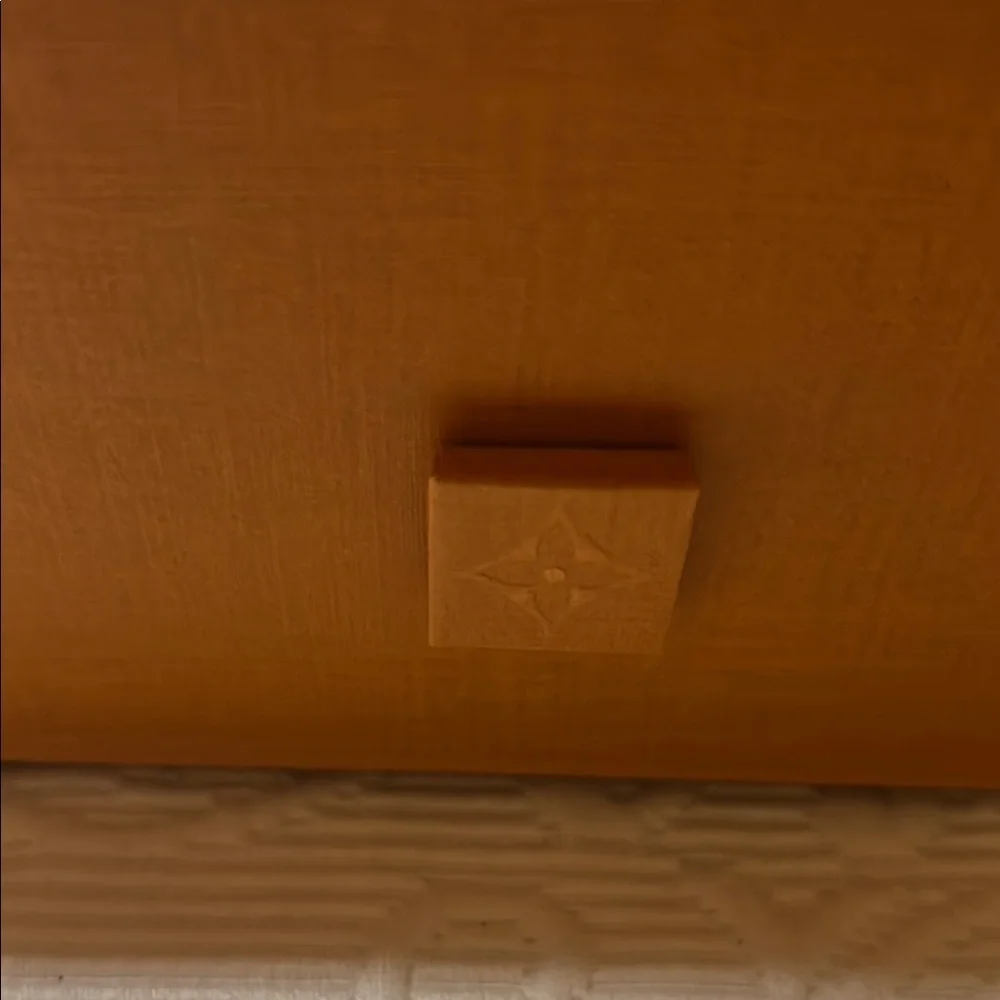 Louis Vuitton Signature  Box inside a LV shipping box with tissue and ribbon.